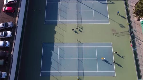 Players On The Tennis Courts