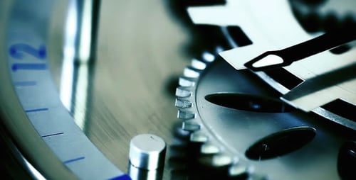 Clock Internal Mechanism Gears Turning Close Up