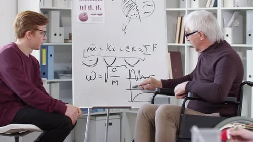Disabled Professor Explaining Line Charts