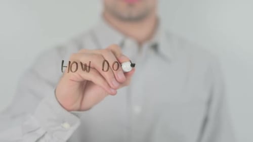 Golden Rules Man Writing on Transparent Screen