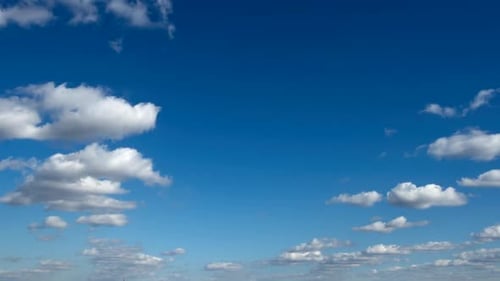 Clouds Floating in the Blue Sky on a Sunny Day
