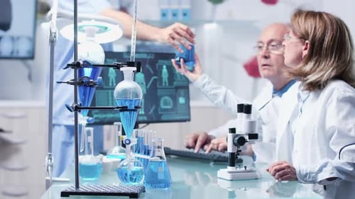 In Modern Research Laboratory Two Scientists Are Debating