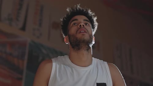 Slowmo of African-American Basketball Player Shooting Ball