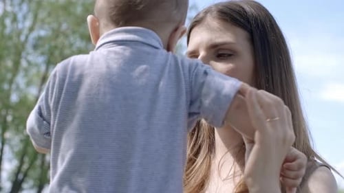 Mother Playing with Cute Boy
