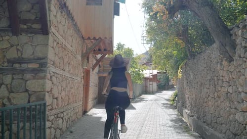 Woman Riding Bicycles Sunny Day