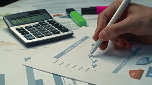 Businessman Working on Finances at Home Office