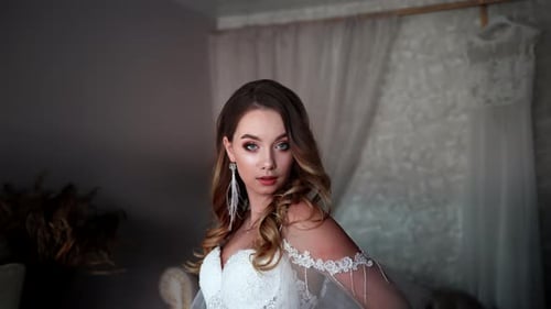 Bride in White Dress Posing Indoors