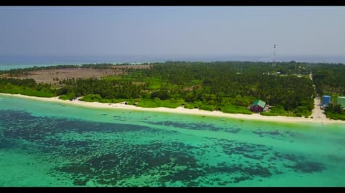Aerial above panorama of tranquil bay beach journey by blue lagoon and clean sandy background of a d