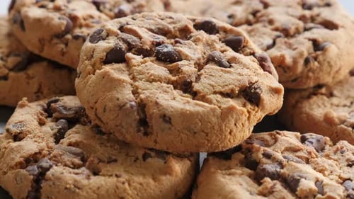 Cookies on the wooden table slow tilting 4K 3840X2160 UltraHD footage - Slow tilt of chocolate cooki