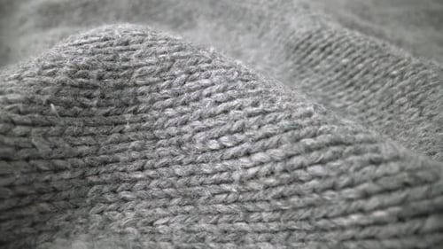 Extreme Detail View of Sheep Wool Cloth Texture Flowing in Macro Dolly Shot