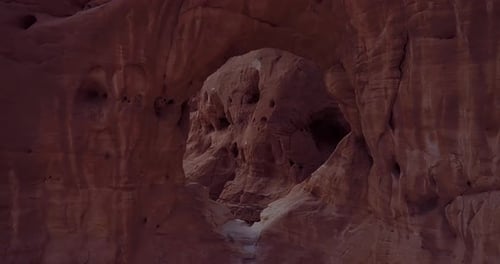 Aerial View of Sandstone Mountain Arch in Desert