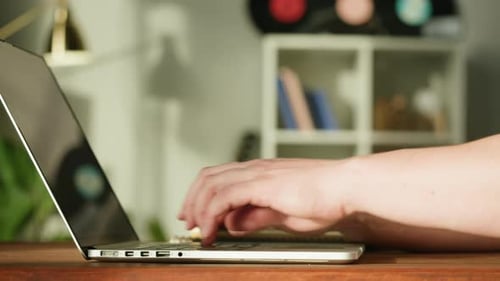 Close up of Hand Opening and Using Laptop