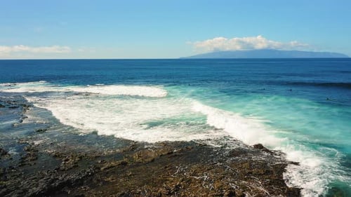 Ocean Deep Blue Waves Crash Into the Black Volcanic Shore of Tenerife