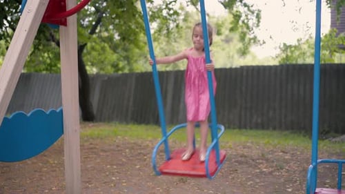 Little Girl Sitting Swing Playground Summer Day Park