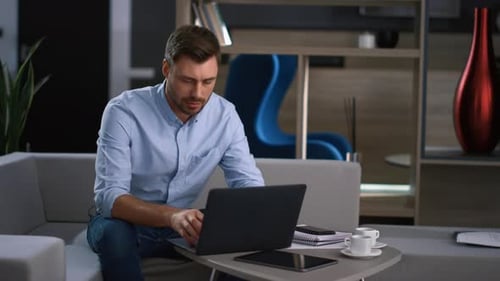 Professional Ceo Working Laptop Computer Device Browsing Social Media in Office