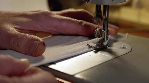 Close Up of Sewing Machine Stitching Fabric