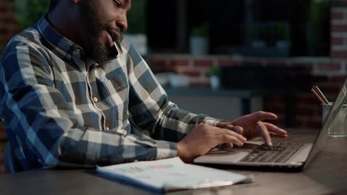 Male Investor Talking on Phone Call to Create Stock Trade Market