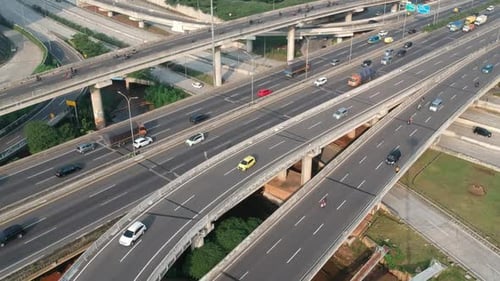 Aerial view of highway traffic flow in the city of jakarta.