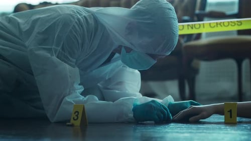 Crime Scene Investigator Examines Evidence