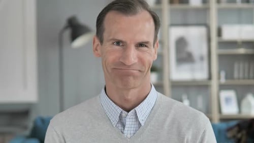 Smiling Man Looking At The Camera Close Up