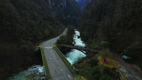 Picturesque Mountain River Flowing in a Gorge Among Picturesque Rocks
