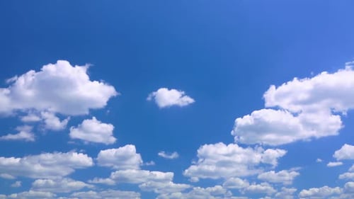 Fluffy White Clouds in a Clear Blue Sky