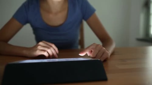 Woman using digital tablet computer