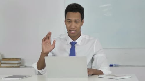 Young Adult Video Conference Call on Laptop