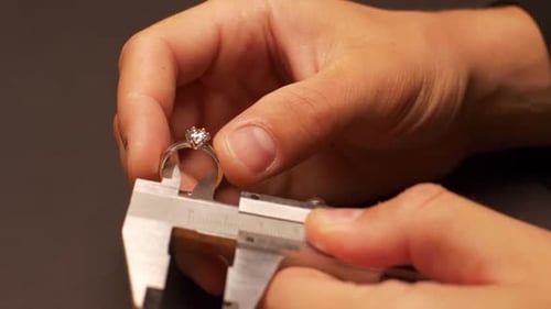Close Up Of A Ring Being Measured