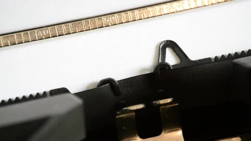 Close up of Typewriter Typing Confidential