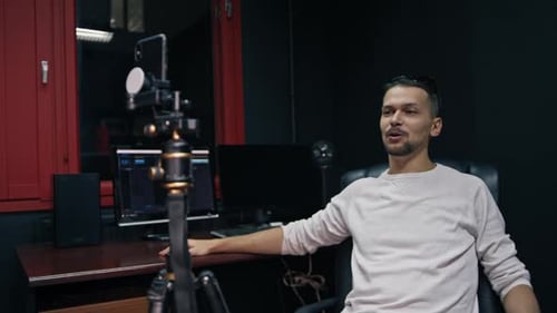 Man Talking to Camera in Office Setting