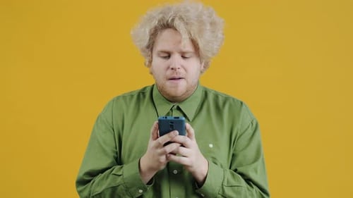 Adult Using Smartphone with Varied Expressions