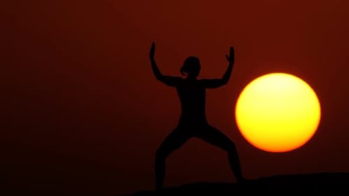 Woman Doing Gymnastics at Sunset Huge Sun