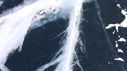 Beautiful Transparent Blue Ice of Frozen Baikal Lake