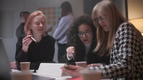 Professionals at Meeting in Modern Office Space