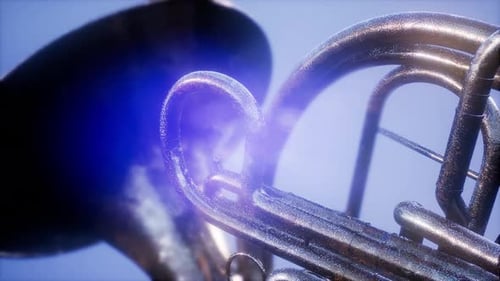 Metallic Tuba Instrument Rotating with Dynamic Light Reflections