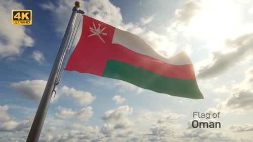 Oman National Flag Waving Proudly Against Sunny Blue Sky