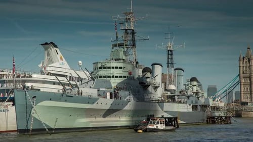 Timelapse london city skyline skyscrapers architecture warship hms belfast