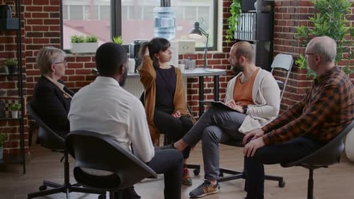 Adults in a Group Therapy Session