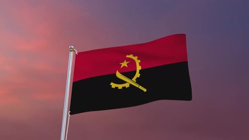 Waving Angola National Flag on Flagpole Against Sunset Sky