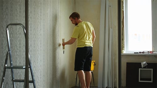 Man Doing Electrical Work Indoors