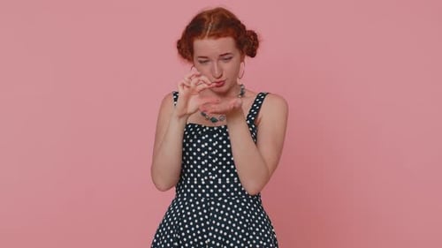 Girl Showing a Little Bit Gesture with Sceptic Smile Showing Minimum Sign Measuring Small Size