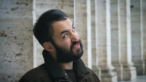 Man with Beard Makes Silly Face Outside