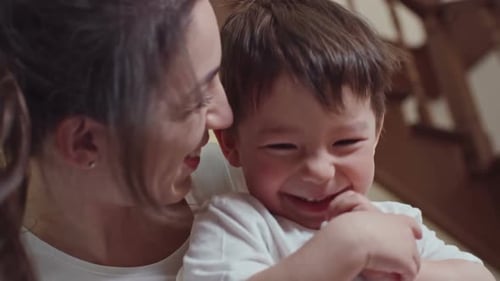 Boy Having Fun with Mother
