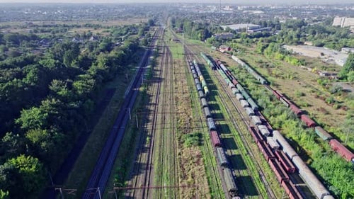 Train Tracks and Train Cars Aerial View