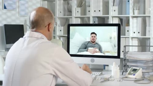 Doctor Consults Patient Via Telemedicine Video Call