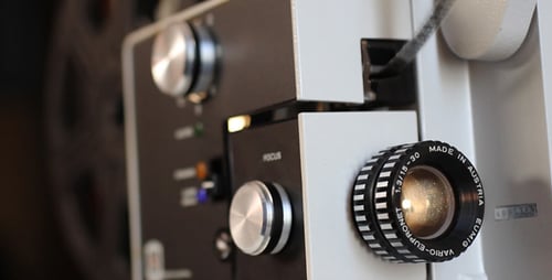 Vintage Movie Projector with Running Film Close Up