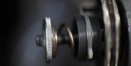 Machine Part with Gray Spring Compressing and Decompressing