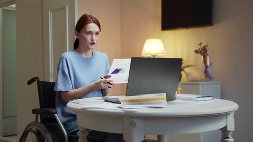 Woman in Wheelchair Presents Data on Video Call