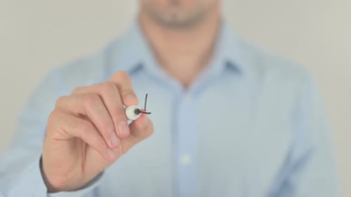 Man Writes the Word Improve on Clear Surface